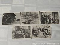 Five cards laid out showing fronts