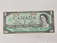 Full front view of uncirculated 1967 Canadian Centennial $1 note