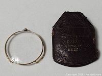 Monocle and leather case overall view