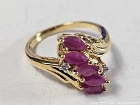 Gold plated ring showing stone setting and band