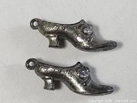 Pair of sterling silver shoe charms, side profile
