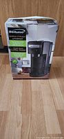 Front view of boxed Brentwood single serve coffee maker