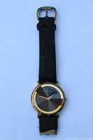 Full view of Fossil PC-7304 wristwatch front showing case, dial, strap condition