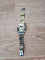 Full view of watch flat showing case and bracelet