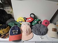 Overview of all 12 hats laid out
