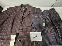 Overview of blazer and plaid pants