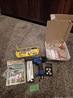 Group shot of all tools, accessory kit, nails, discs and fittings