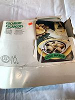 Retail box showing Chef Mates branding and escargot set information
