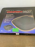 Retail box showing Comfort Tech black gel seat cushion with product details