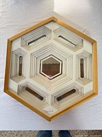 Front view showing full hexagon artwork