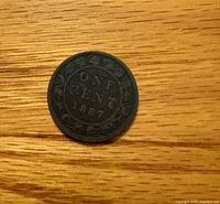 Reverse showing ONE CENT 1887 within wreath