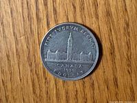 Reverse showing Parliament Buildings design, date 1939, denomination ONE DOLLAR