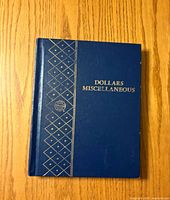 Front cover of blue Dollars Miscellaneous coin album