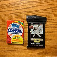 Front view of both sealed card packs