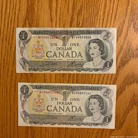 Front of both banknotes showing portrait, denomination, serial numbers