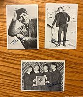 Fronts of the three Beatles cards