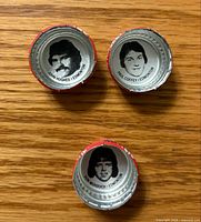 Interior faces of three Pepsi hockey bottle caps showing player portraits and names