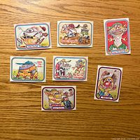 Fronts of all seven stickers laid out