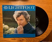 Front sleeve showing title and artist with record partially visible