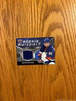 Front of Rookie Materials card with player image and jersey swatch