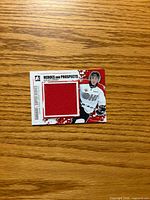 Front of memorabilia card showing player image and jersey swatch