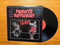Front of Porky’s Revenge! sleeve with record partially visible