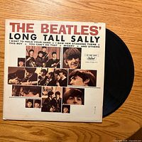 Front cover and vinyl partially visible