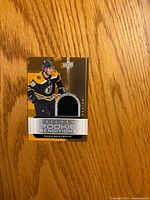 Front of Zach Senyshyn Upper Deck Trilogy Rookie Renditions jersey card with black jersey swatch