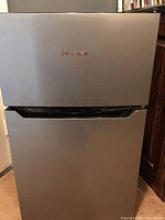 Front view showing Hisense logo and stainless finish