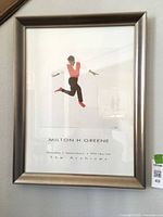 Full view of framed print hanging on wall