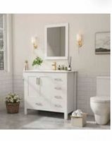 Stock image showing assembled white vanity with ceramic top and mirror