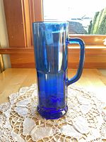 Full side view of cobalt blue glass stein