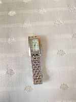 Front view of watch showing dial, bracelet and overall condition