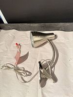 Full view of brushed nickel clamp desk lamp with cord and clip