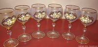 Full set of six matching frosted blue wine glasses