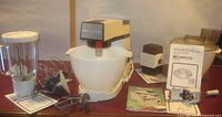 Overall lot showing mixer, bowl, blender, grinder, manuals