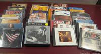 Four columns of CD cases laid out showing various album covers