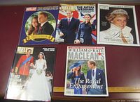 Five magazines laid out; four Hello! and one Maclean's visible