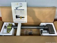 Boxed WindyNation linear actuator with bracket, hardware bag and manual