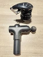 FitRx corded massager and Titan massage gun together