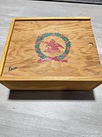 Anheuser-Busch wooden box top view with logo and writing