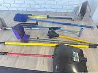 Overall view of long-handled tools laid out