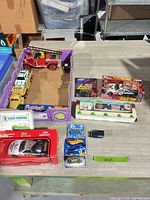 Group view showing boxed and loose vehicles on tabletop