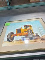 Full view of framed pastel artwork showing construction vehicle