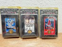 Front view of three sealed Mini Mint frames for Blue Jays, Spurs, Angels