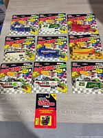 All ten packaged die-cast pieces laid out on table