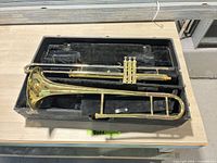 Trombone bell, slide and valve section in open case