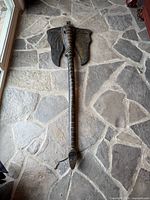 Full view of carved wooden elephant mask showing overall size and form