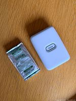 Printer and sealed film cartridge on tabletop