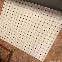 Flat view of vinyl mat displaying full tile pattern